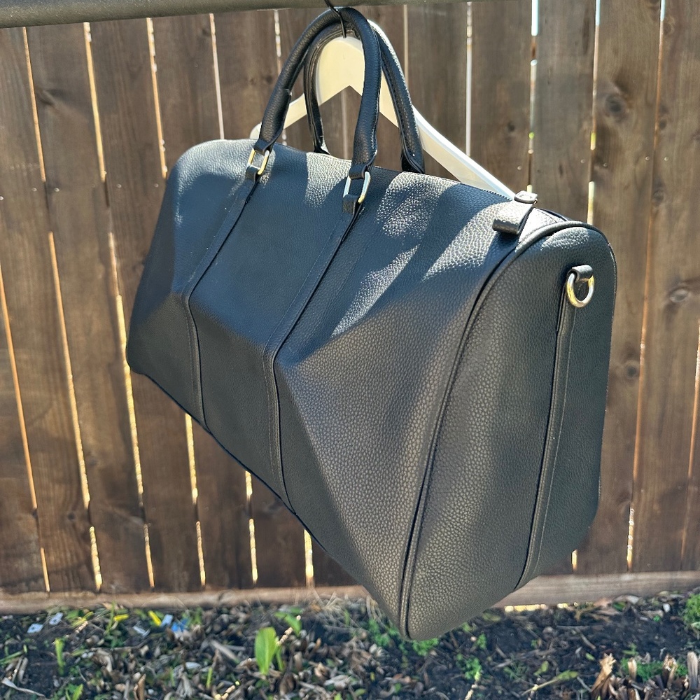 black leather travel duffle bag